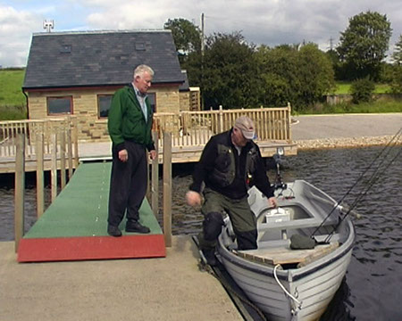 Man Entering Motor Boat, Arnfield Fly Fishery