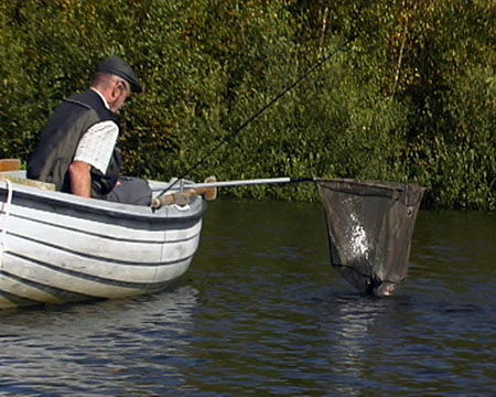 Trout in landing net, Arnfield Fly Fishery